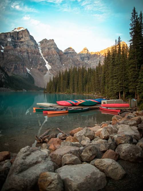 Canoes on Moraine lake wallpaper for mobiles and tablets