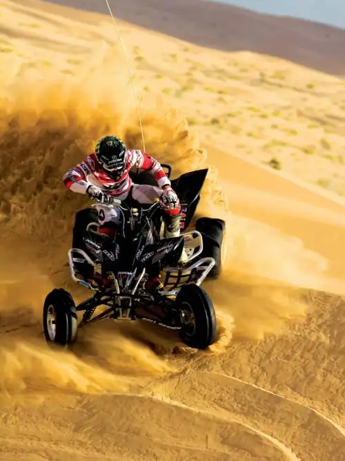 Quad in dunes wallpaper