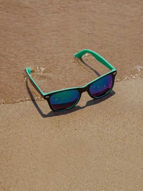 Sunglasses on the beach wallpaper