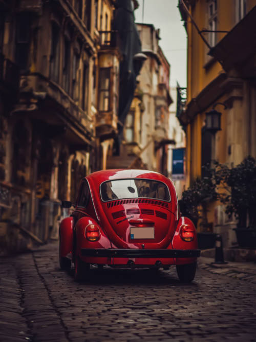 Volkswagen beetle in old town wallpaper for mobiles and tablets