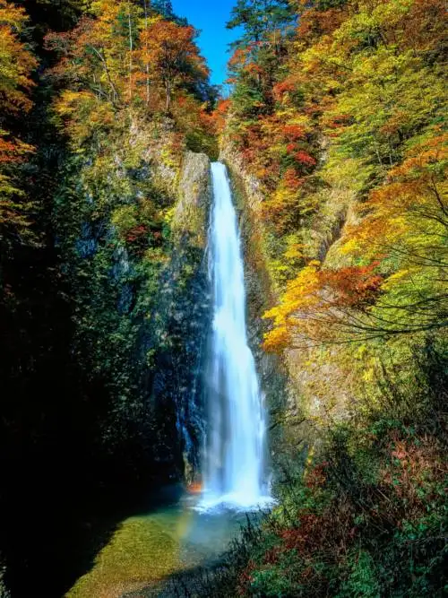 Waterfall in autumn wallpaper