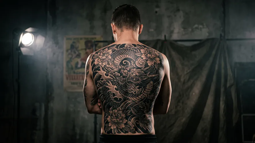 Man with Full Back Tattoo