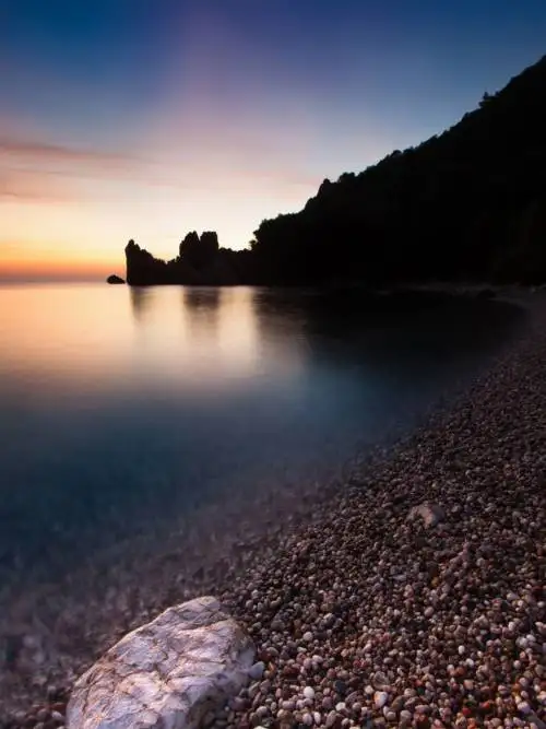 Pebble beach at sunset